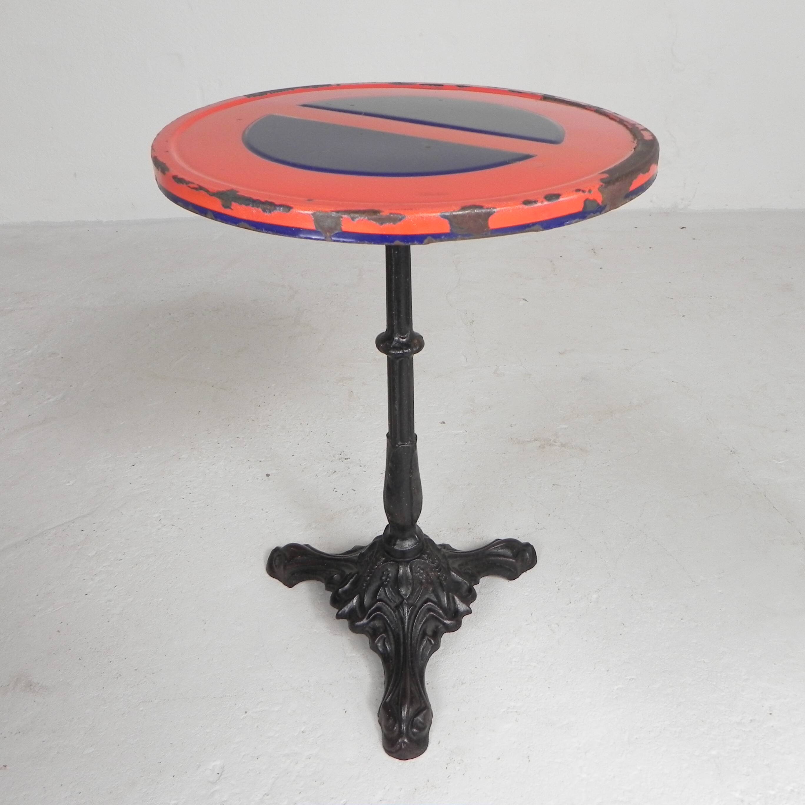 Bistro table with a cast iron base and a traffic sign as a tabletop, Paris 1920s.