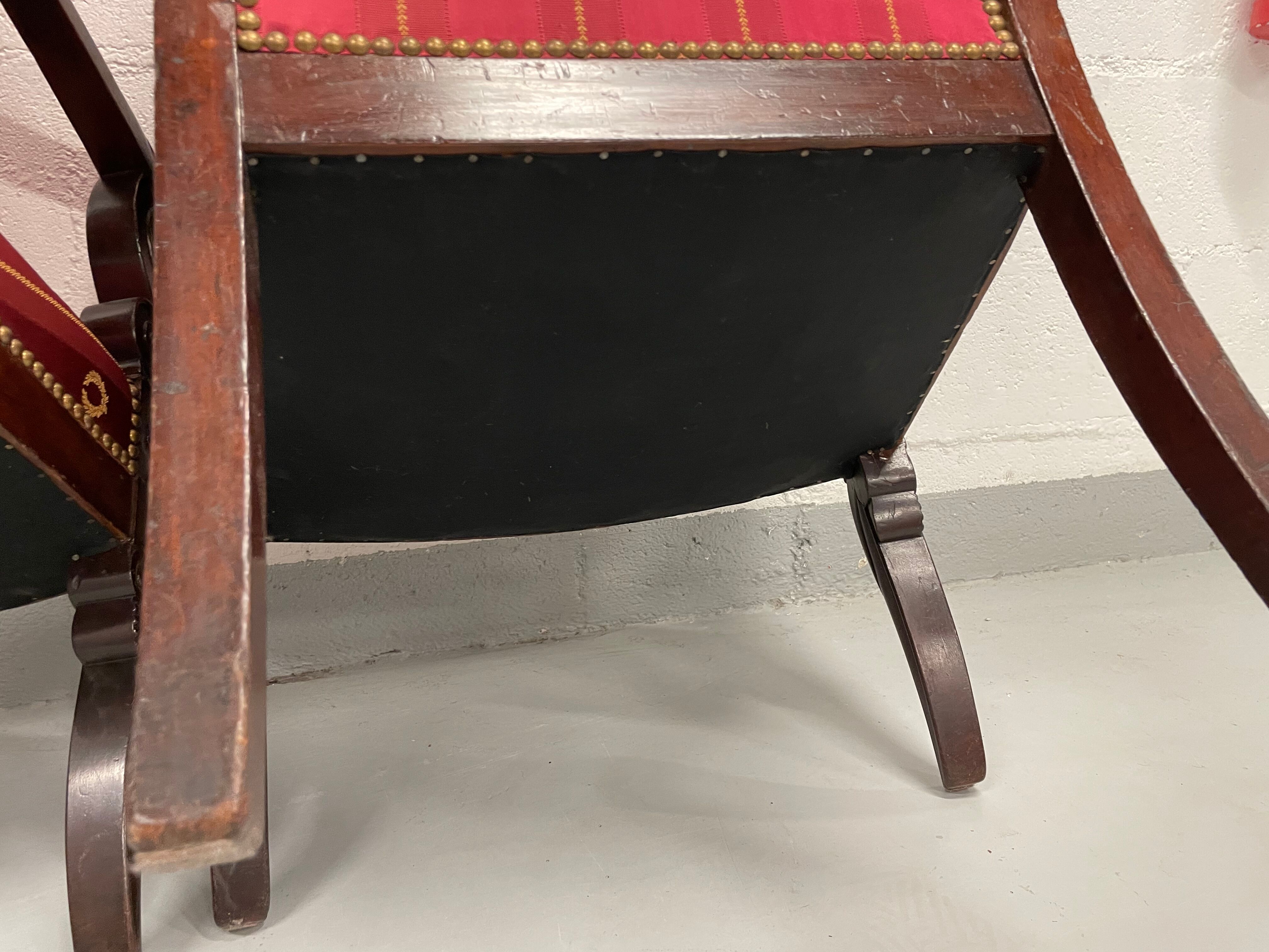 Pair of empire period armchairs in mahogany and silk