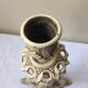 Large candle holder in patinated white painted metal