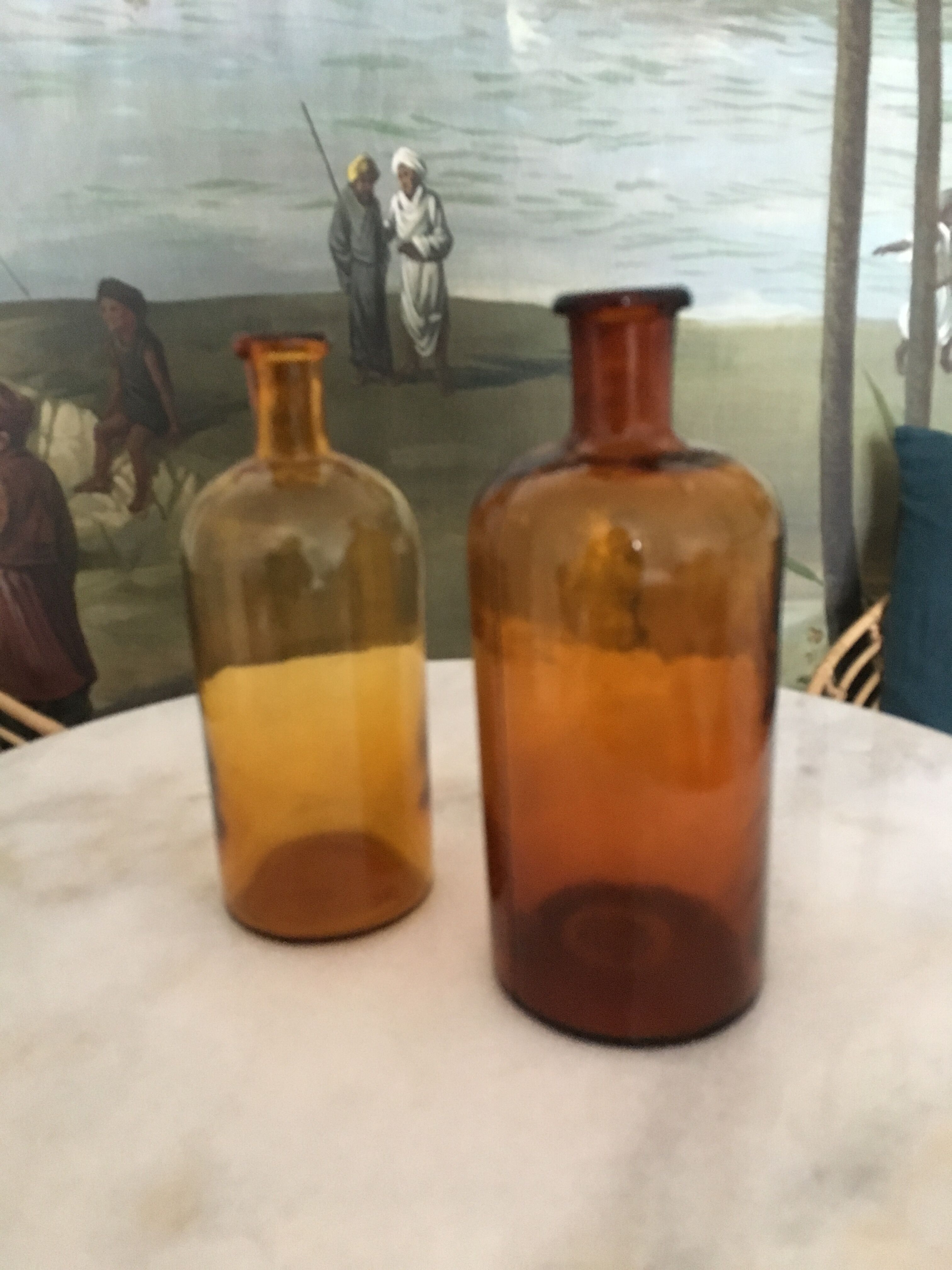 Duo of amber apothecary bottles