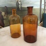 Duo of amber apothecary bottles