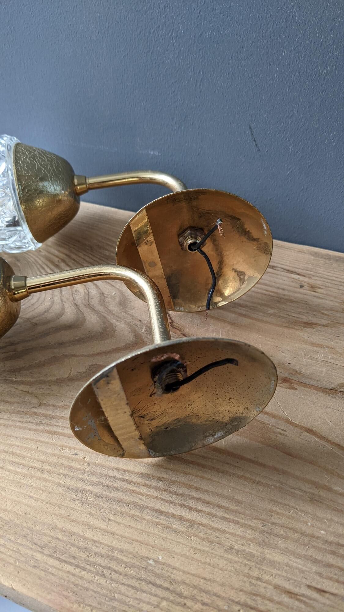 Old pair of vintage wall lamps gold metal and glass