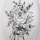 Oval dish of the Luneville factory with bouquet of black flowers