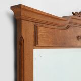 Miroir Art Déco en chêne à décors sculptés et miroir à facettes, années 1930