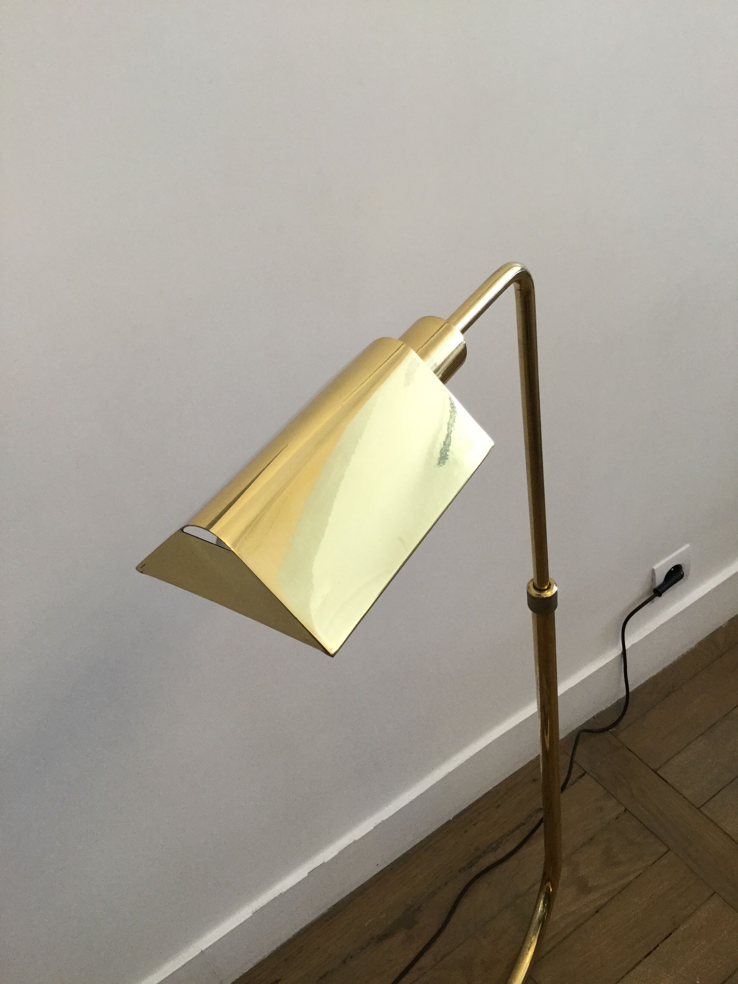 Golden brass e-reader by christian liaigre 80's