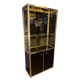 Hollywood Regency style bookcase shelf, gilded brass and black lacquered wood, 1970
