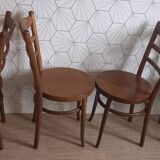 Set of 4 Baumann bistro chairs with round seats.