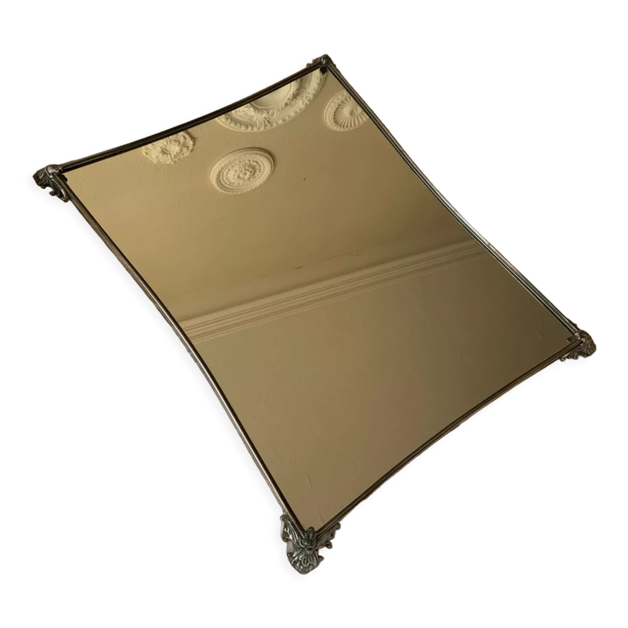 Miroir en metal argenté bord incurvé