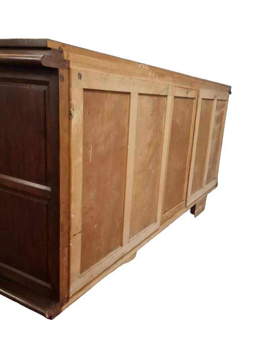 According to Charles Dudouyt: sideboard in a row in solid oak.