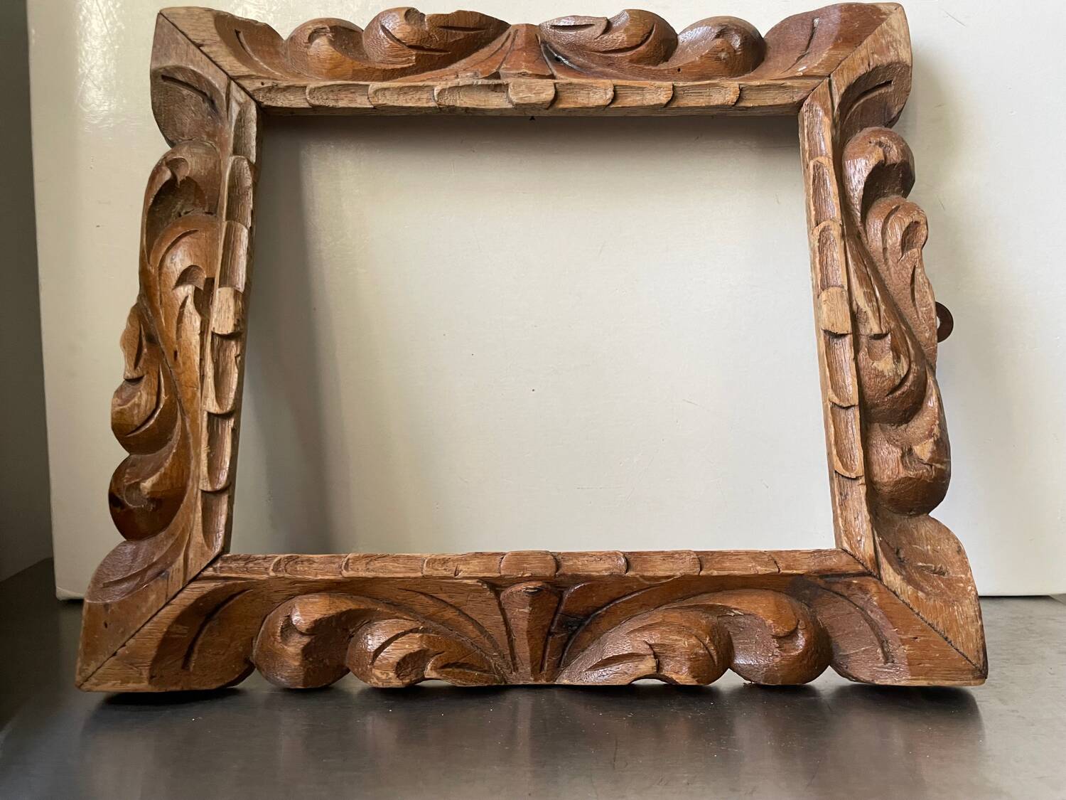 Antique handcarved frame   solid wood 33.5  x 29 cm  opening measurements 23.5 cm x 19 cm cedar wood