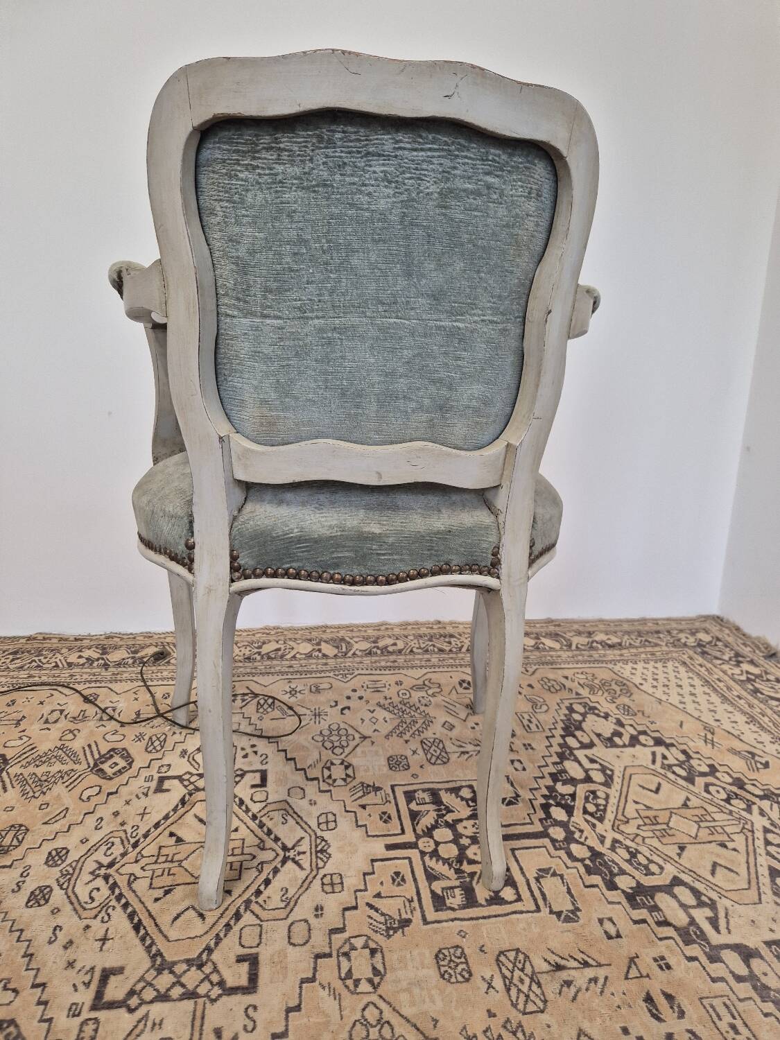 Louis XV style cabriolet armchair in patinated wood and velvet