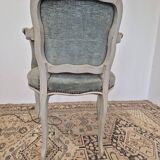 Louis XV style cabriolet armchair in patinated wood and velvet