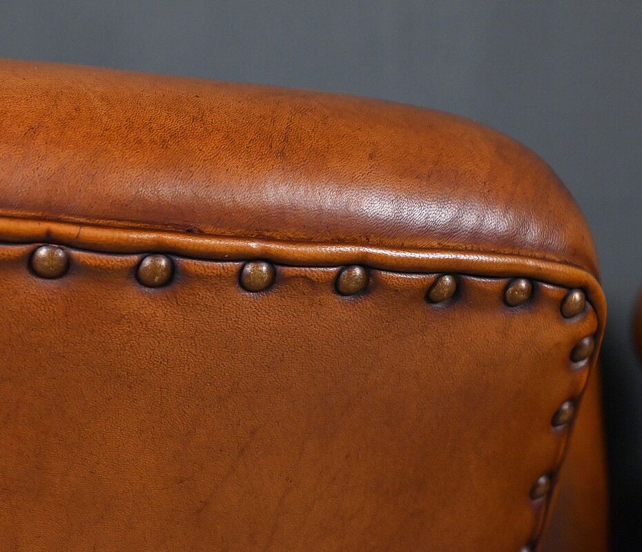 Paire de fauteuils club en cuir