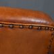 Paire de fauteuils club en cuir