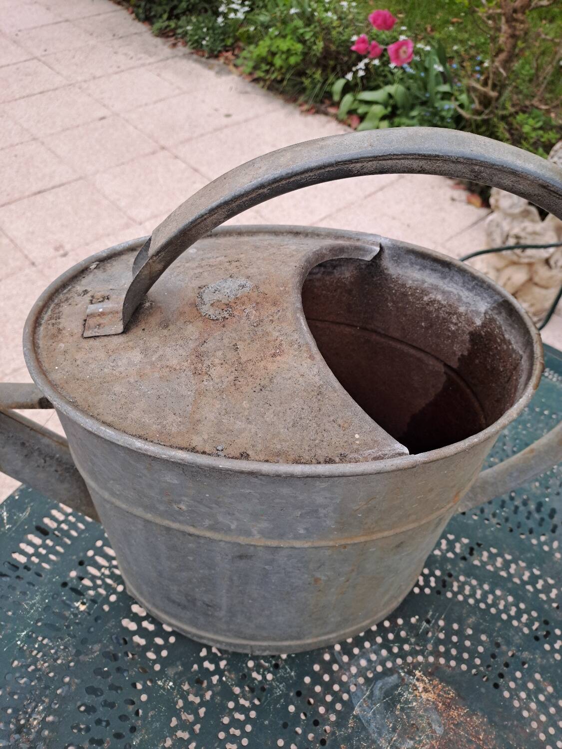 Old zinc watering can
