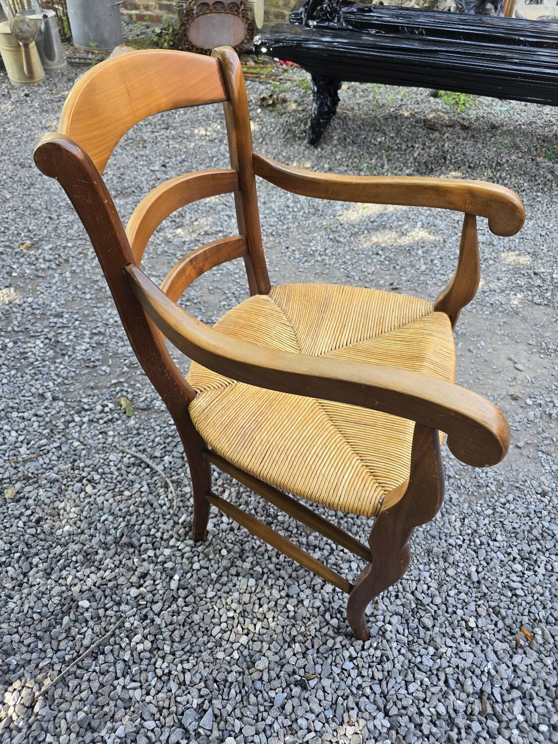 Cherry wood straw armchair
