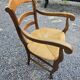 Cherry wood straw armchair