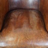 Cognac-colored sheepskin leather club chair