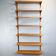 Danish wall shelf by Hansen and Guldborg, teak, aluminum rails, 1960s.