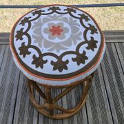 Rattan pouffe with cushion