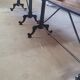 Large bistro table with a wooden top and cast iron legs - 2m56
