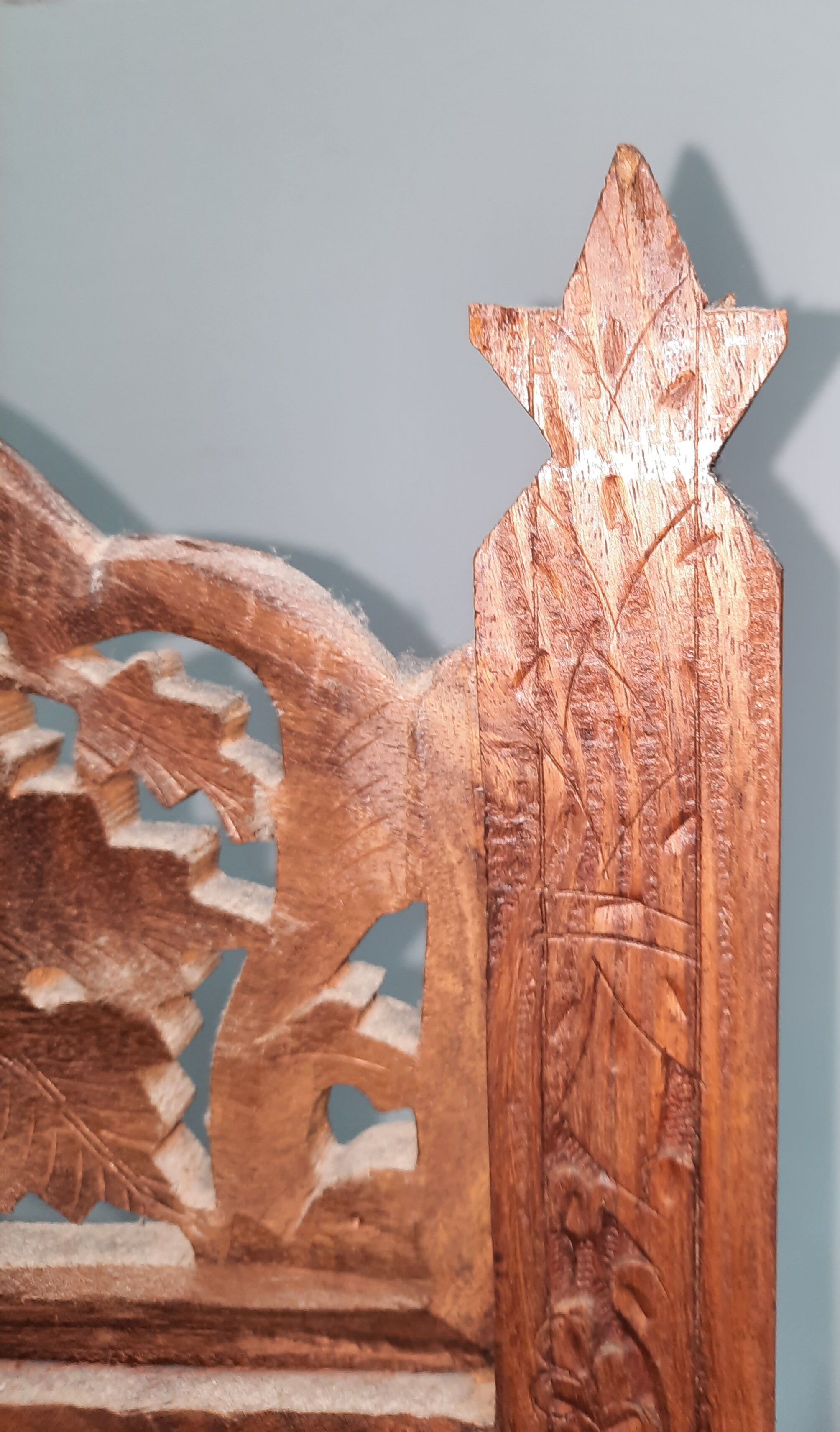 Asian screen in cut-out wood