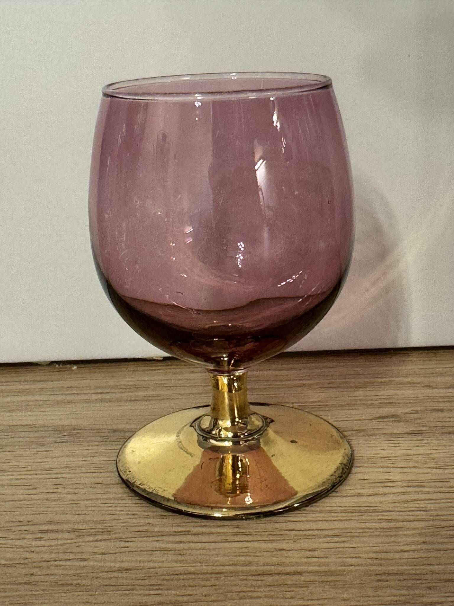3 coloured smoked glass liqueur glasses with golden stems, vintage.