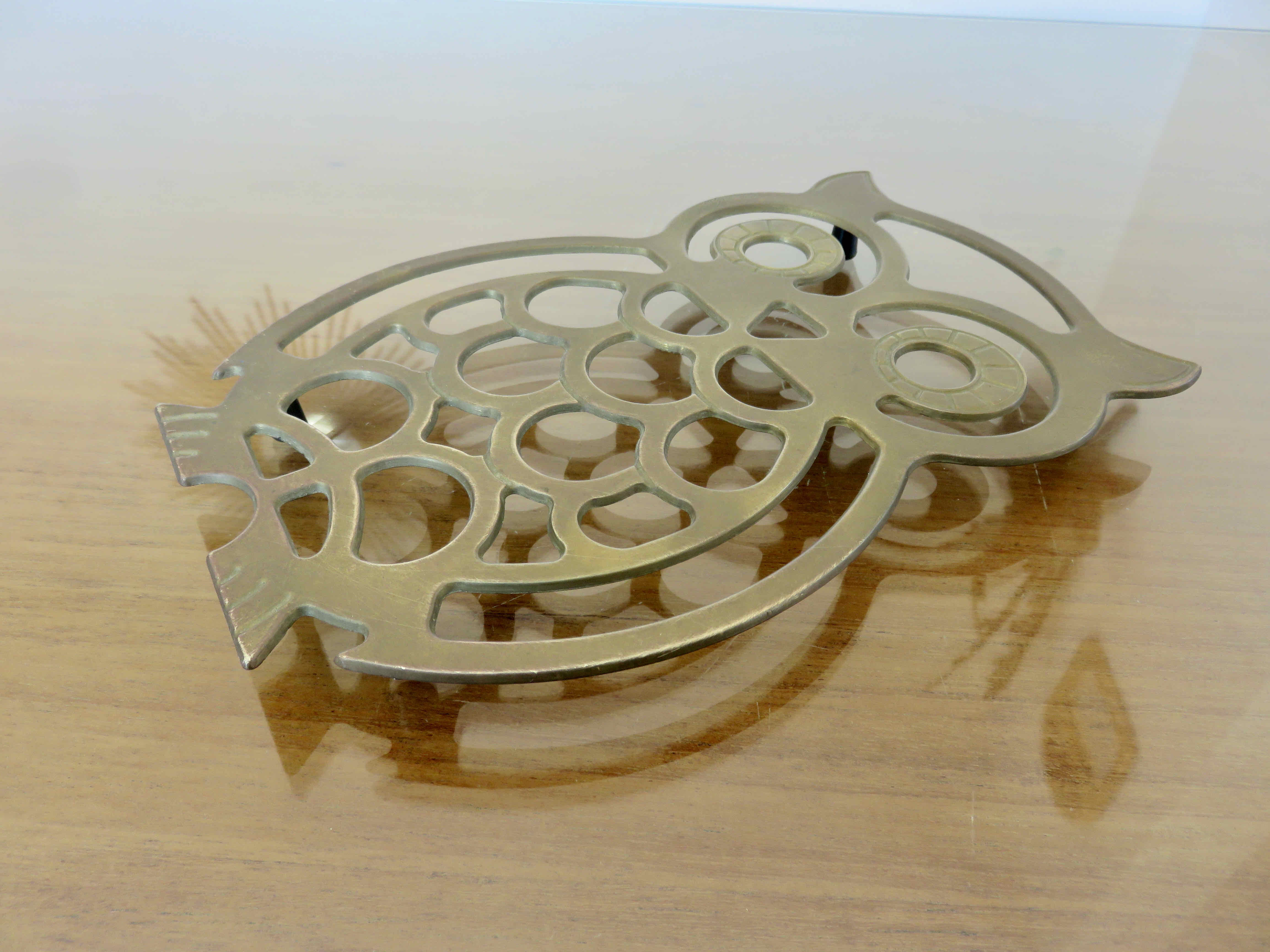 Brass "owl" trivia 70s