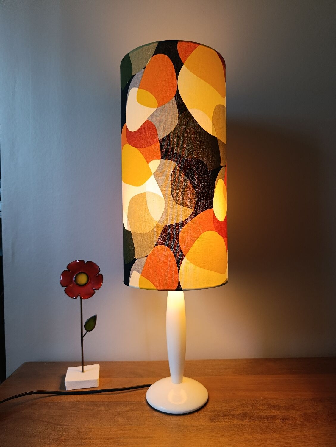 vintage lamp with a white wooden base, multicoloured sixties lampshade