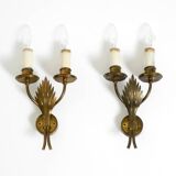 A pair of mid-century modern brass wall lamps by Vereinigte Werkstätten