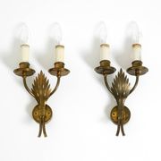 A pair of mid-century modern brass wall lamps by Vereinigte Werkstätten