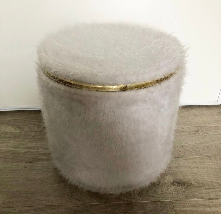 Vintage brass pouf with fur.
