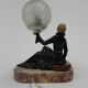 Art deco desk lamp sitting woman with globe
