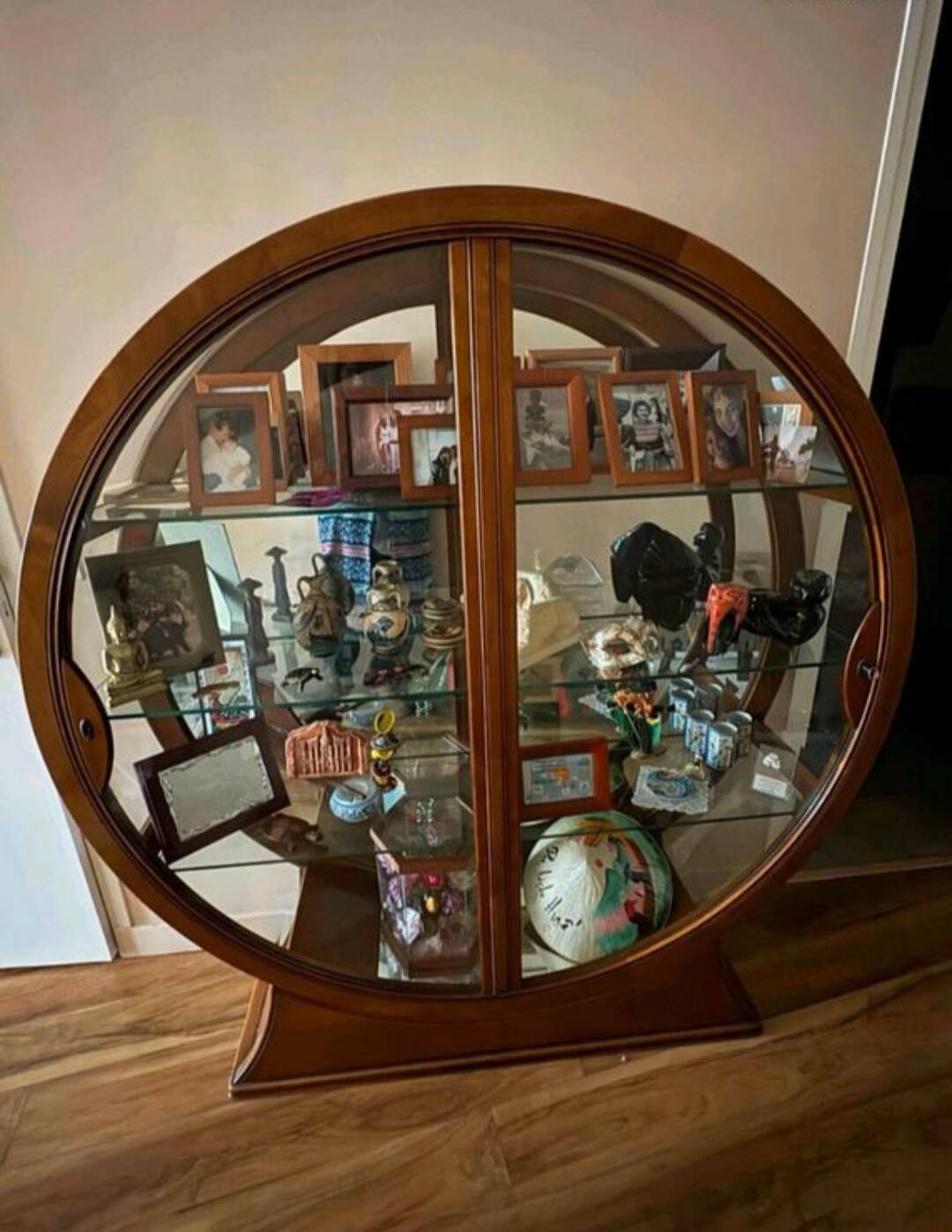 Glass-fronted library in cherry wood by Fourrier