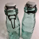 Two bottles with canned goods l'ideale