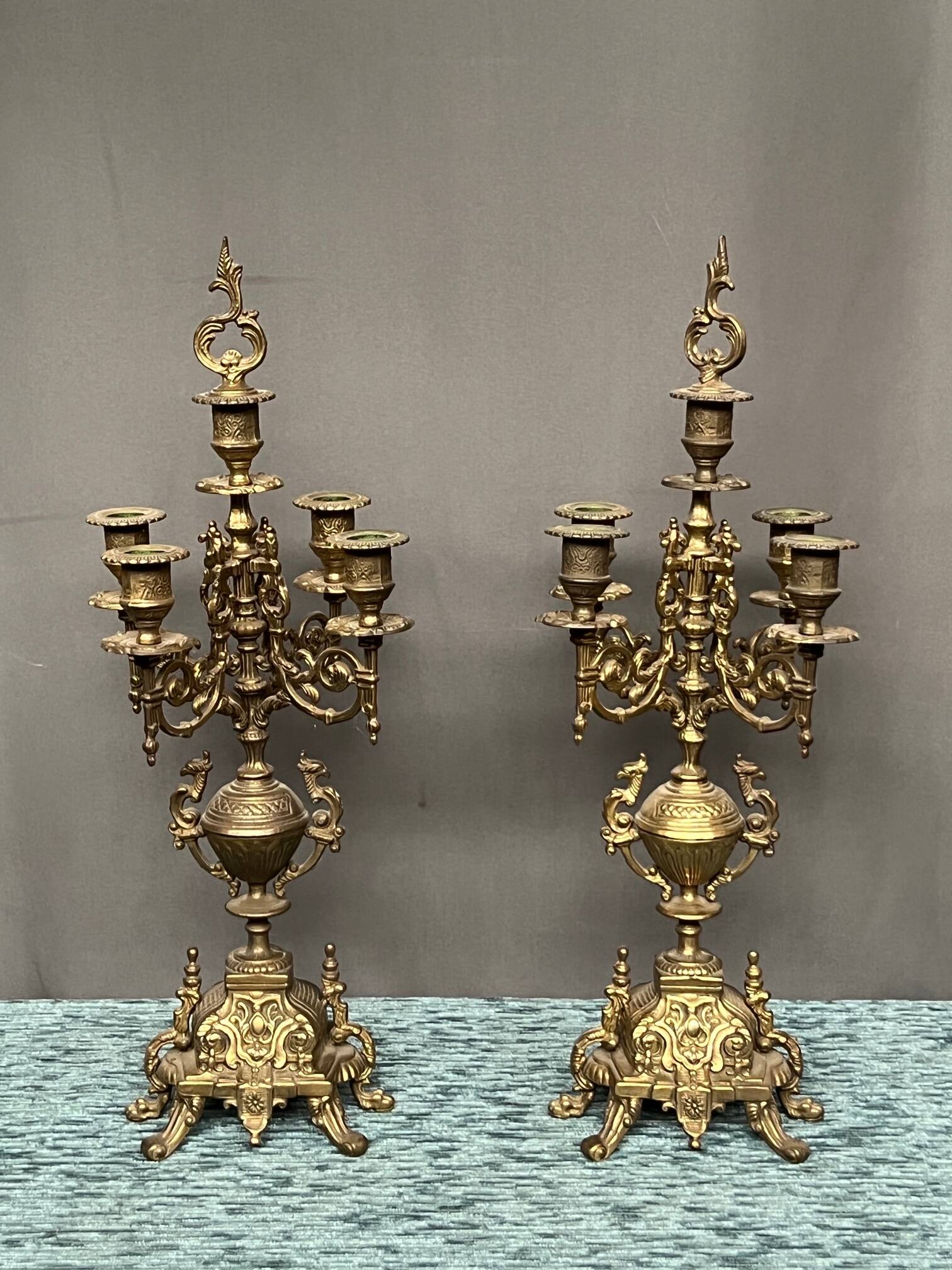 Pair of Renaissance style candlesticks. Solid bronze.
