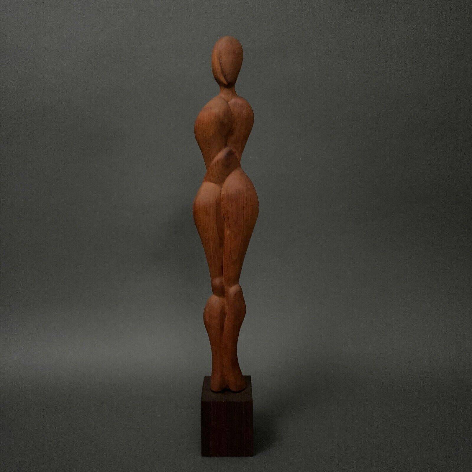 Carved wooden sculpture of a woman by Calin Hentea, 20th century