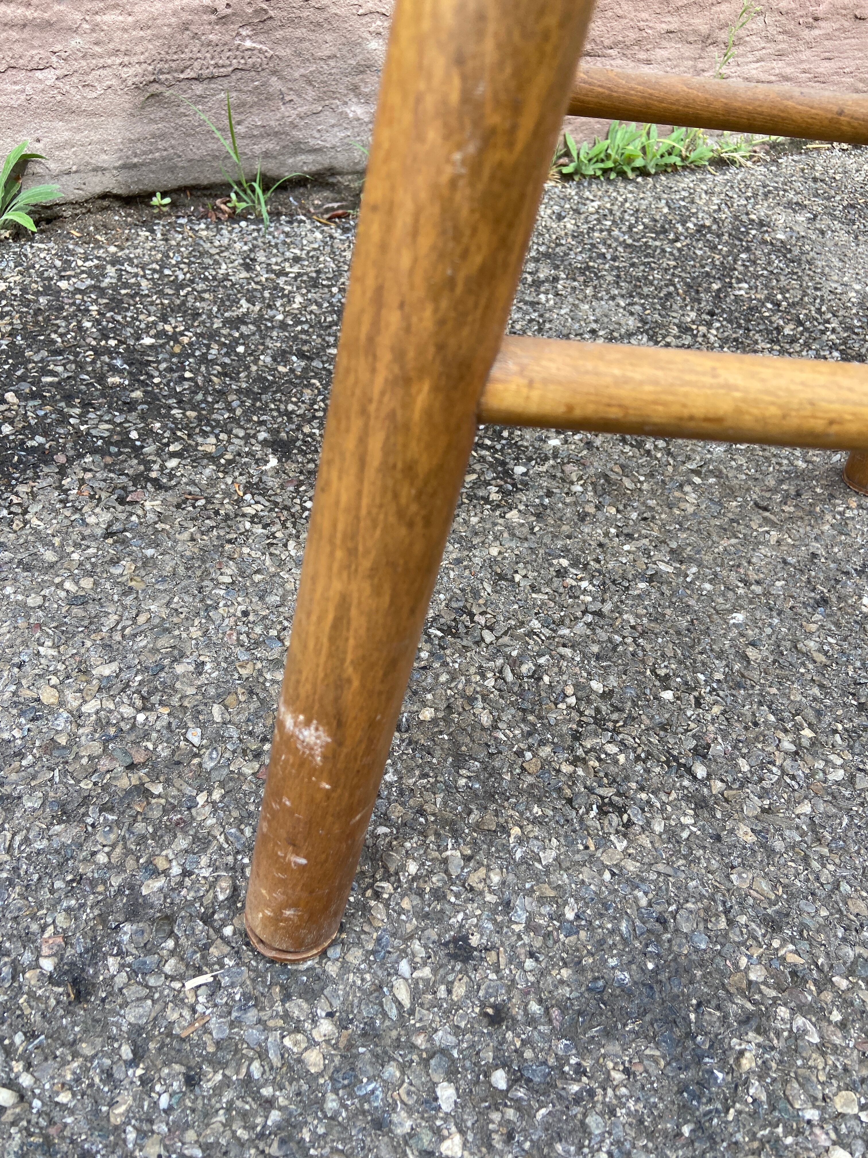 pair of vintage wooden bar stools