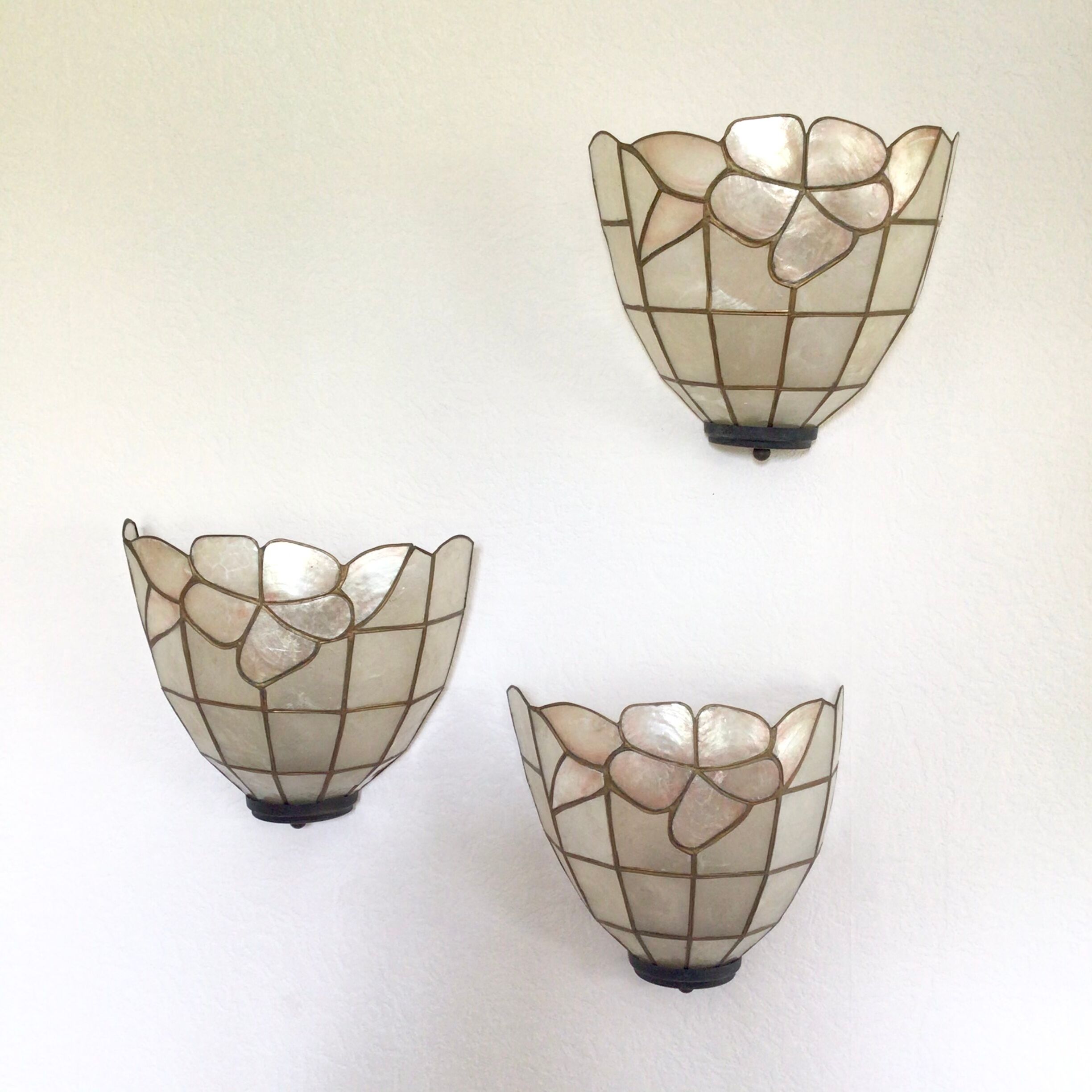 Trio of mother-of-pearl wall lamps