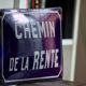 Old Enamelled and bulging "Chemin de la Rente" street plate, in perfect condition, on its cast iron support