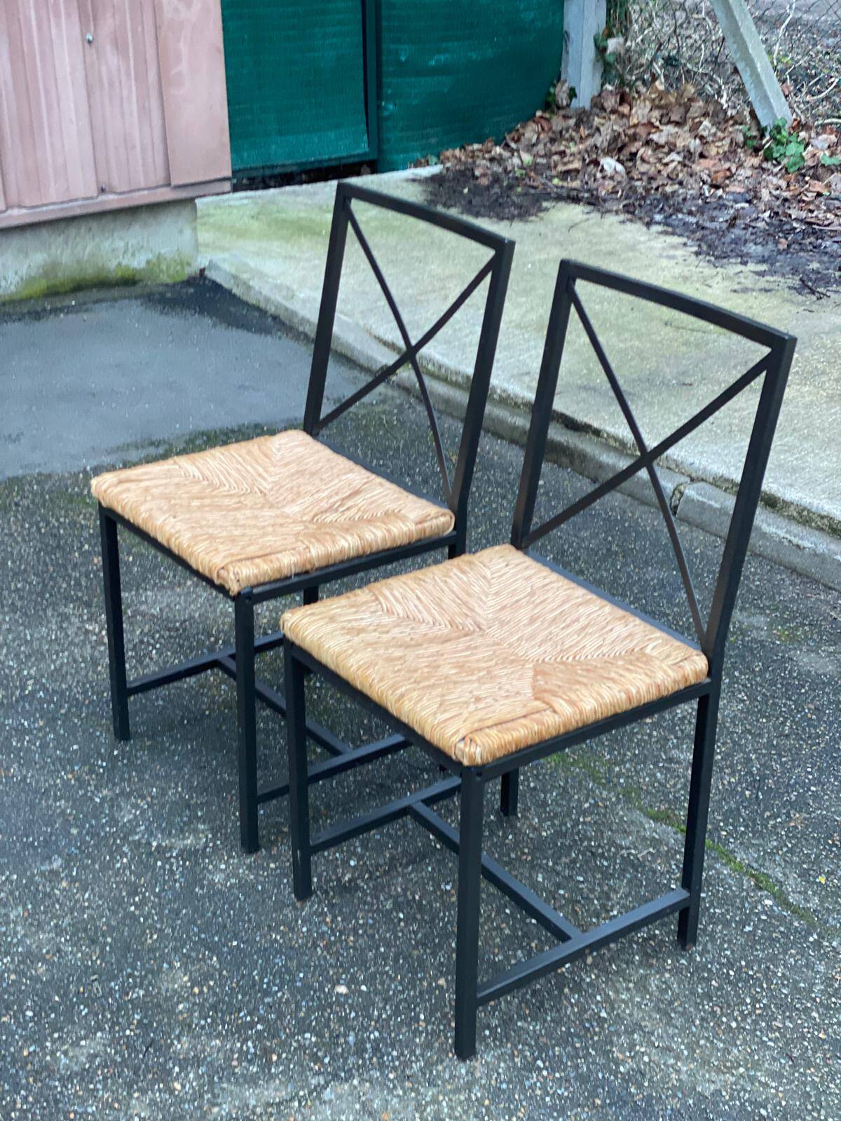 2 Scandinavian chairs with black steel and straw from IKEA Granas.