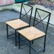 2 Scandinavian chairs with black steel and straw from IKEA Granas.