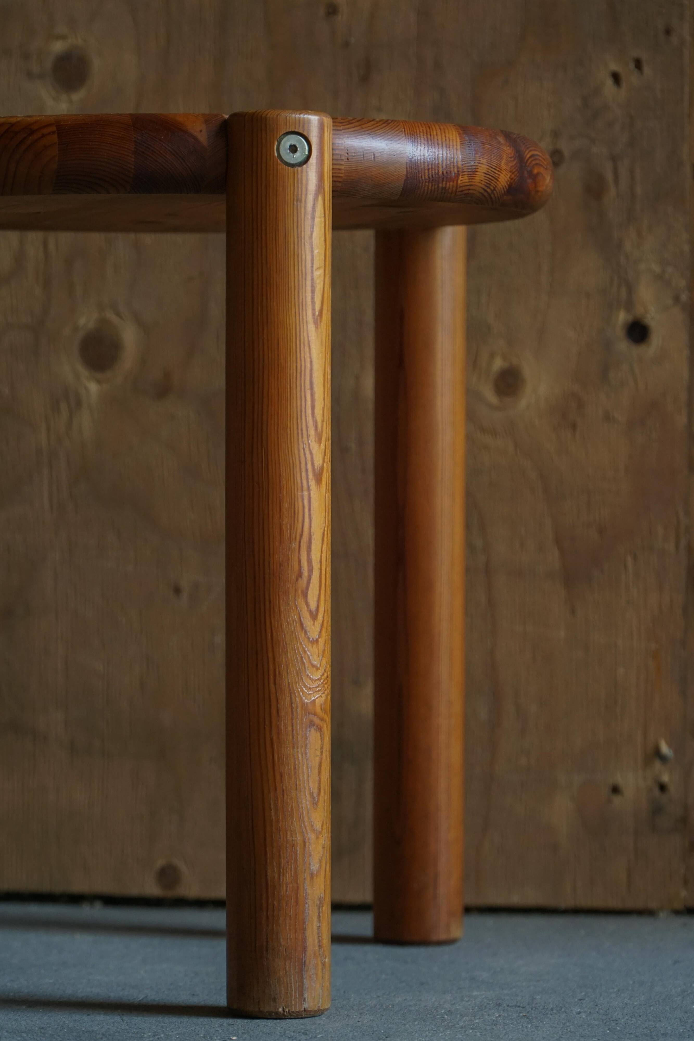 Modern Scandinavian tripod stool from the 20th century with a circular seat, 1970s.