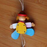 Old toy, articulated wooden puppet