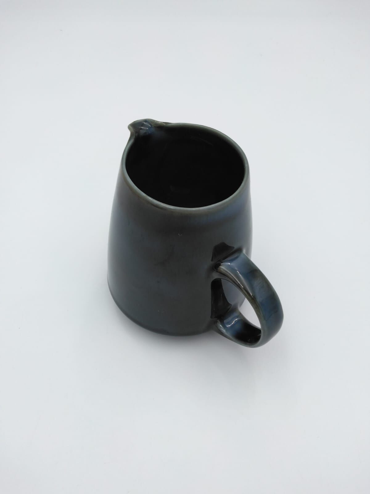 Porcelain pitcher from Virebent