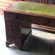 English pedestal desk with green leather top