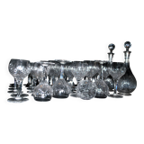 Baccarat set of 35 crystal glasses + 2 flower model carafes 9157 from 1907