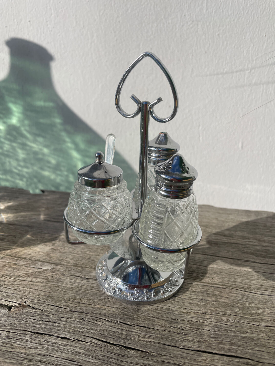 Silver-plated metal and glass salt and pepper shakers