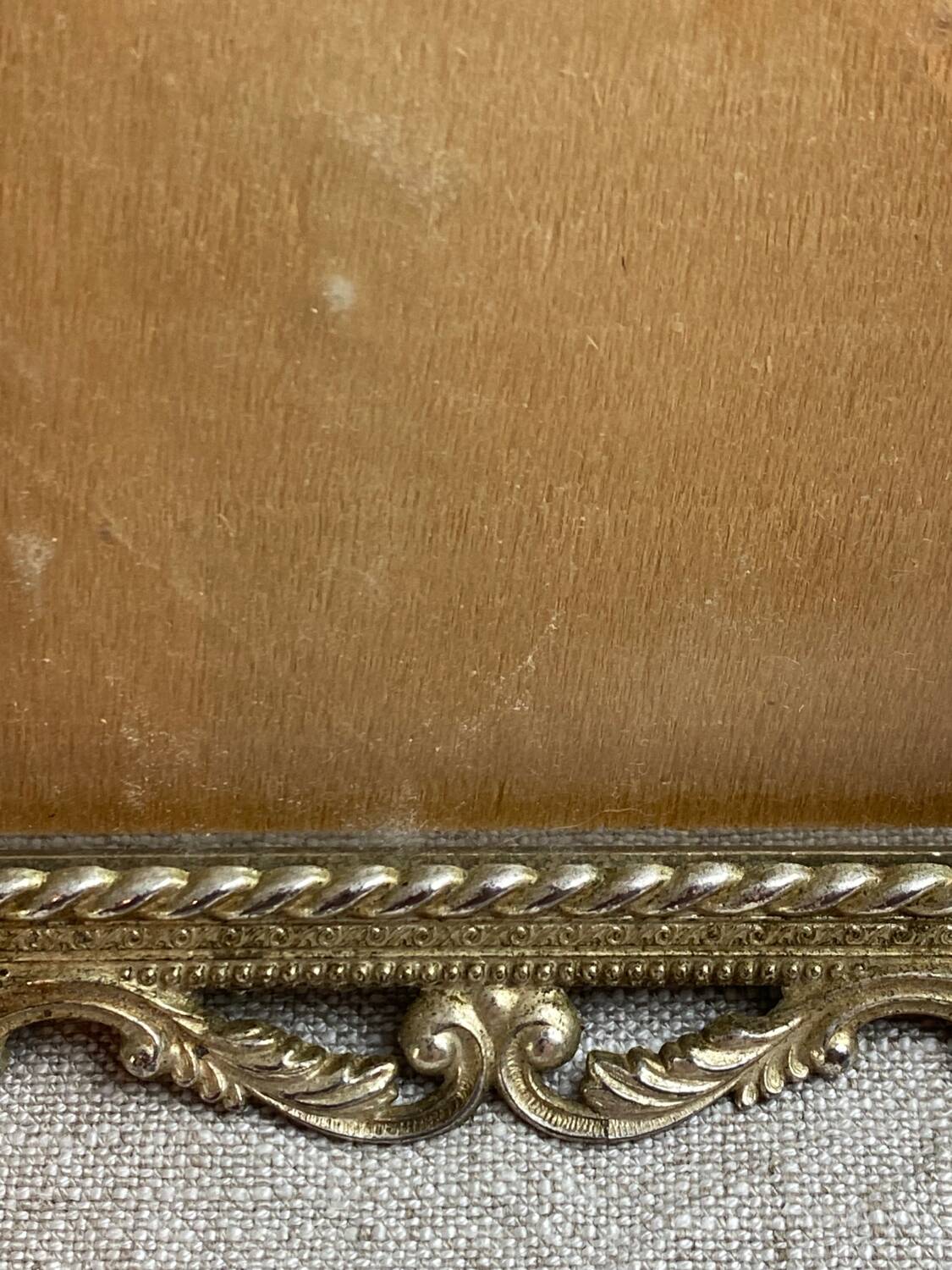 Italian gold metal frame on stand