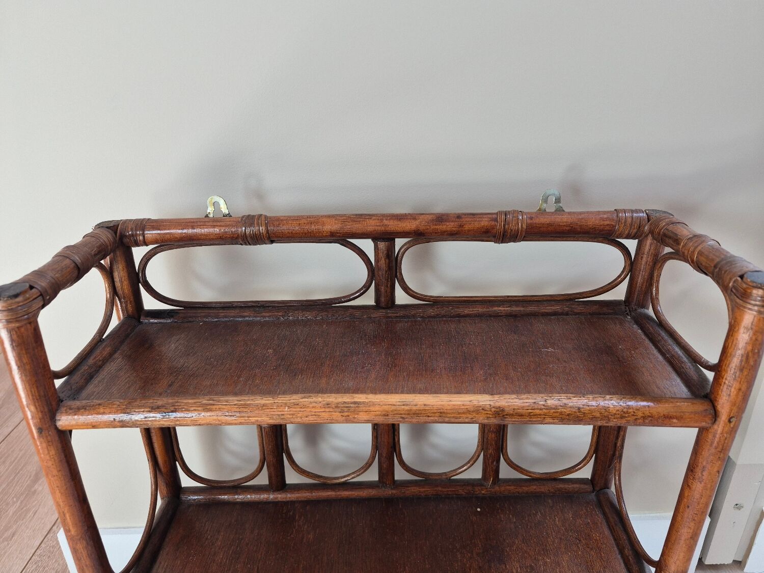 Wall shelf and rattan